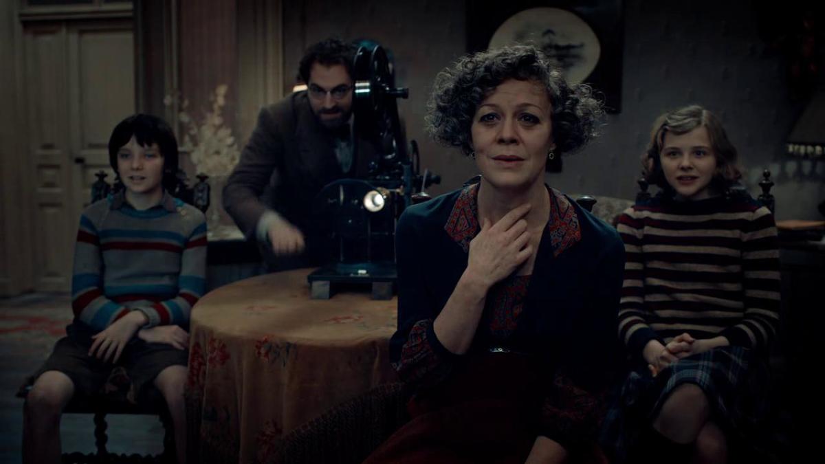 A SCENE FROM THE FILM "HUGO." THE CHARACTERS ARE FROM THE LEFT TO RIGHT: HUGO CABRET; RENE TABARD; MRS. MELIES; AND ISABELLE