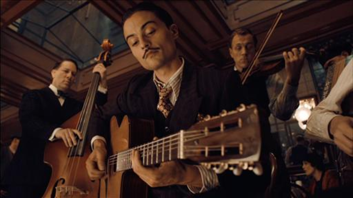 DJANGO REINHARDT AND HIS ORCHESTRA PLAY INSIDE THE TRAIN STATION IN THE MOVIE "HUGO"