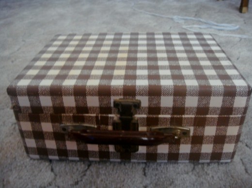 Suitcase covered with contact paper