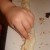 Fold the dough over to meet the other side and pinch tightly together.