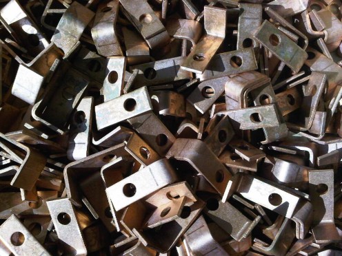 Copper angles CNC punched and CNC bent before being treated by acid dipping.