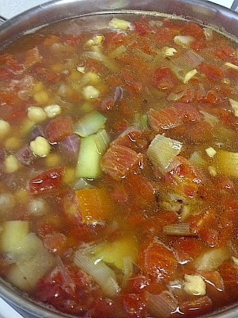 Simmer the vegetables with the tomato and beans before adding the spices.