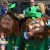 Leprechauns lead off the parade waving to thousands of spectators along Pope Avenue.