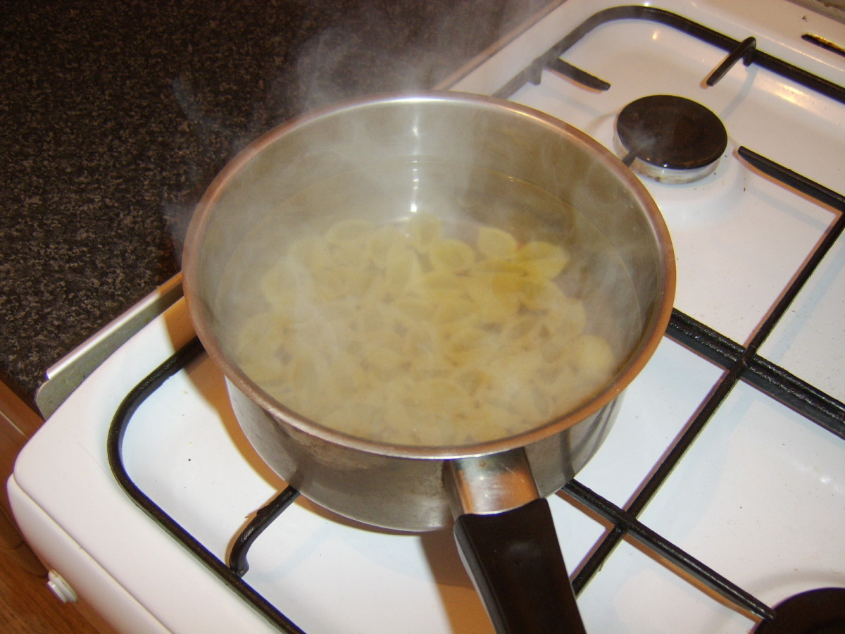 Pasta shells are added to boiling, salted water