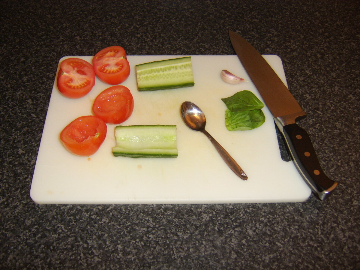 Deseeding the tomatoes and cucumber for salsa