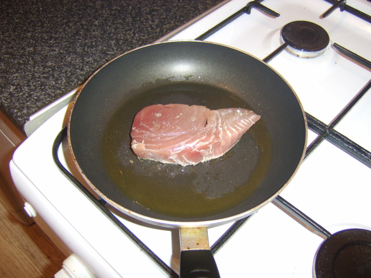 Searing the tuna in a very hot pan