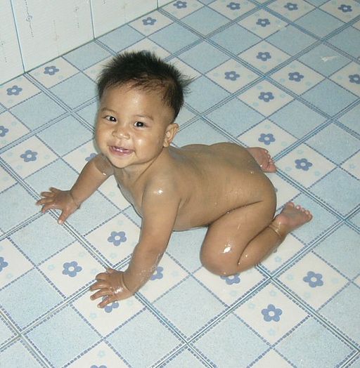 Show off the photos of your grandson in a photo book.