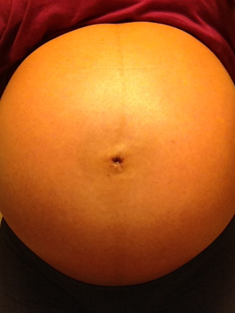 Linea Nigra & a belly button that has almost popped.