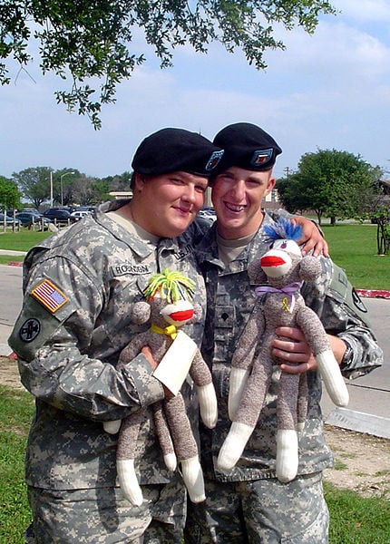 These monkeys are created by The Sock Monkey Ministries of Chelsea, Alabama. Each monkey is given to a member of the US services to show their support. 