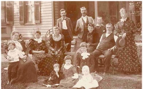 Bessie Bruford & her aunt SophiA Window-Filley's family in the side yard of the Filley home on the west side of Burlingame KS, late summer or early fall 1893.