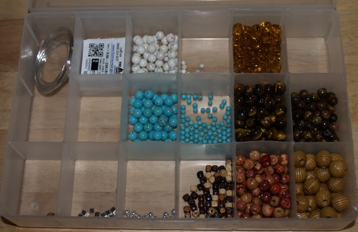 It is recommended that beads of your choice be stored in plastic boxes such as the one pictured here.