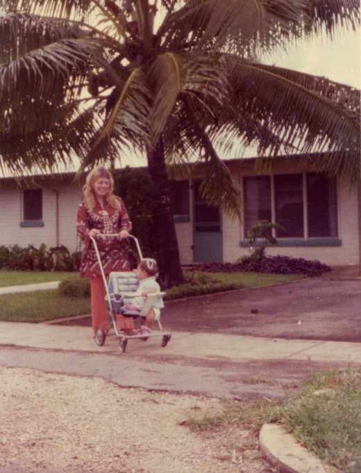 In my new home in Tonga with my baby. This picture was taken at Liahona Campus, the school where we lived for several years. 