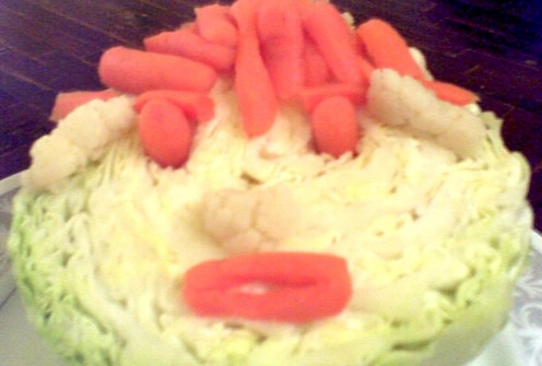Cabbage with attitude! I love making art out of food and objects! Cabbage,carrots and cauliflower.