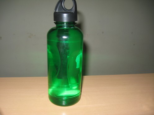 a green water bottle to quench my thirst