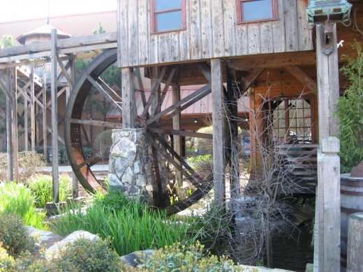 The waterwheel at the front of the building.
