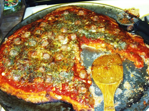 Turkey sasuage, garlic, and herb pizza.