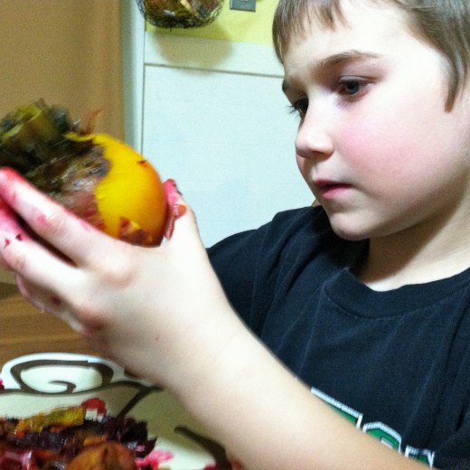Peeling beets is an easy task for children to help with in the kitchen.