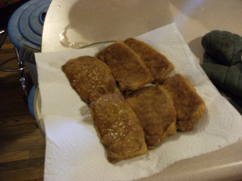 Six Porkchops thin cut, coated with seasoned flour then Deep fried.
