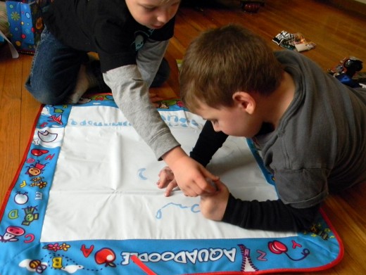 Can unschooled children learn to work with others on projects that do not interest them? 