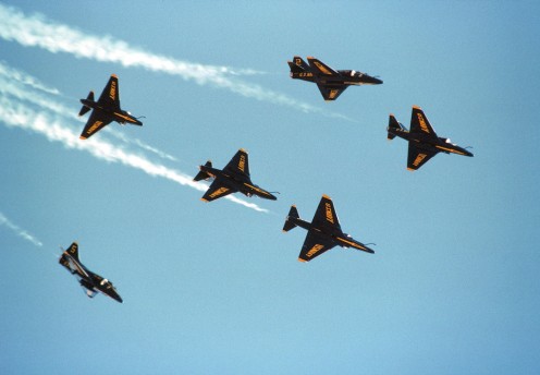 A-4F Skyhawk Blue Angels flight demo team execute a "Fleur-de-Lis."