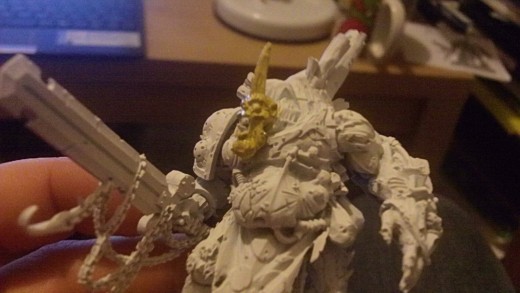 Start by painting a light color for the head. A Bronzed flesh works quite well.