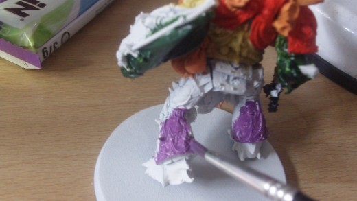 Paint in the purple with an even coat.