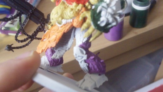 Once you've painted the legs with purple....