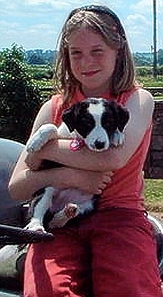 a younger Kate with Gin as a pup