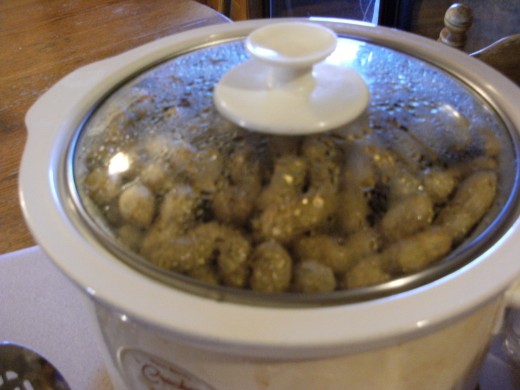 Showing you that peanuts float. Put something on top of them to weight them down.