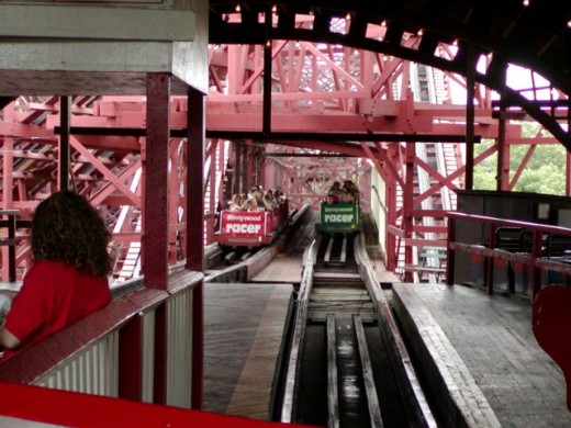 See the green train entering the station. When it left only moment earlier it was on the other side.