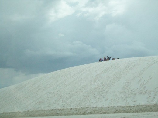 Picnickers atop a dune
