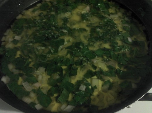 Potatoes with spinach, onions and garlic