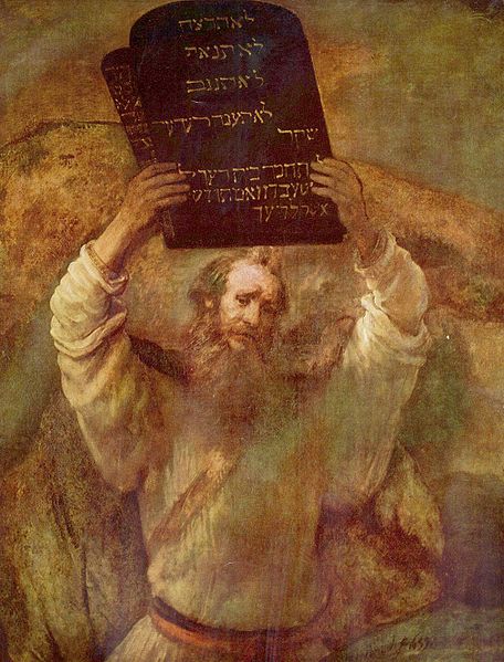 Moses with the Ten Commandments -- tablets of stone soon to be broken in his wrath.