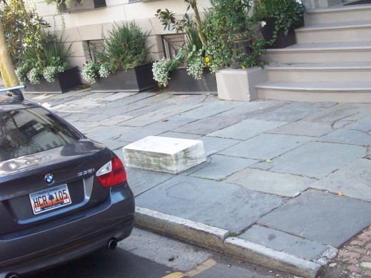 Old mounting blocks cannot be removed and are scattered throughout the city.
