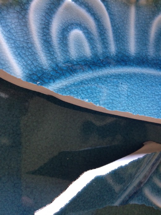 Broken blue dishes from fab online shopping site