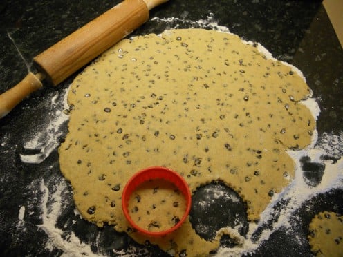 Roll out the dough, and cut out the biscuits