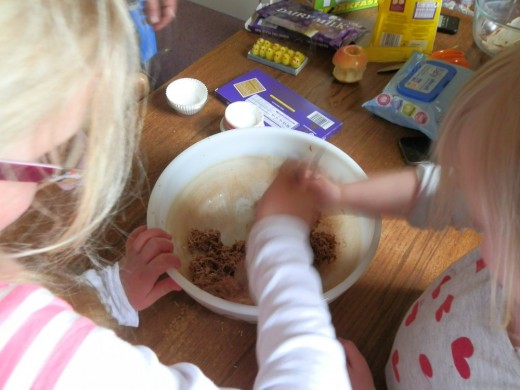 the kids stir in the melted chocolate to the grains
