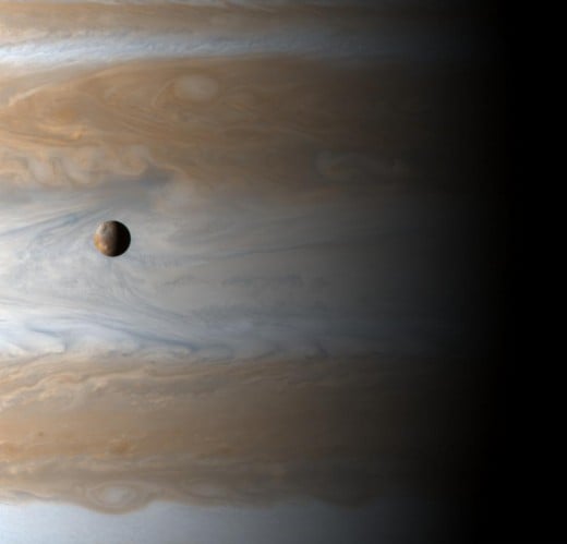 Io is about the same size as our moon, but Jupiter is so massive that you could snuggle four Earths inside its Great Red Spot, a tornado that's been going since Gallileo first spotted it.