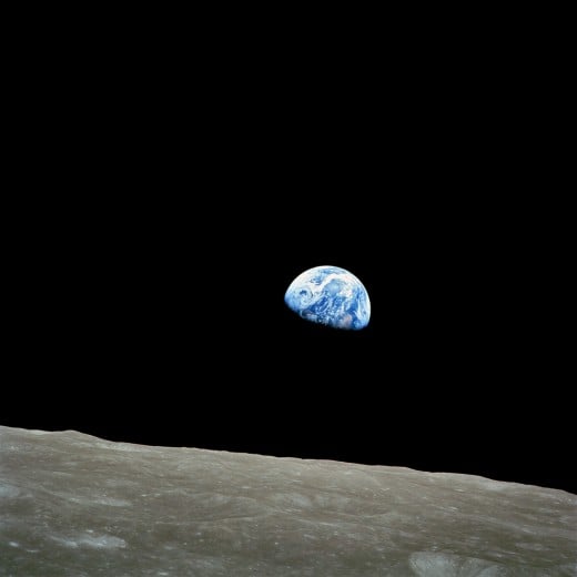 The classic shot of the Earth rising around the limb of the moon as Apollo 8 circled Earth's silent sister. Taken by astronaut Bill Anders. 