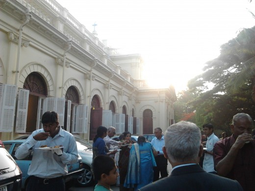 The congregation enjoying the fellowship breakfast, alongside the church, on the opposite side.