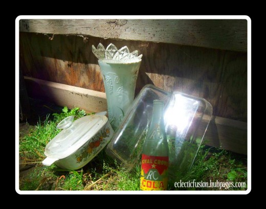 Pyrex covered dish, Fire-King type vase, Pyrex glass pans, glass ashtray, RC bottle.