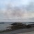 smoke passing the American Flag at Anchor Beach