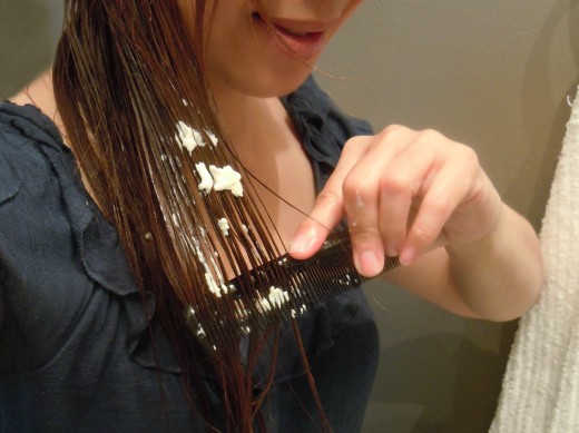 Apply mayo evenly from the scalp down to the tip of your hair.