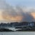 smoke from brush fire fills the horizon as it spills over long island sound 
