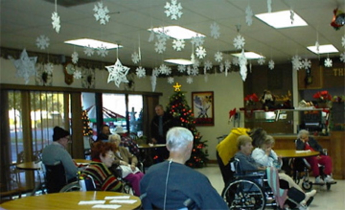 Residents in convalescent home wait for carolers to to add some variety and cheer to their holiday season. 