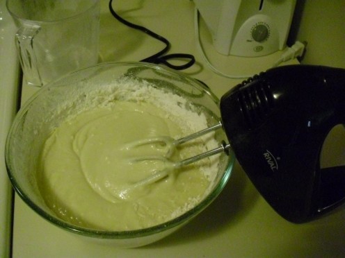 Mix together all ingredients for the yellow cake, alternating between liquids and dry ingredients.