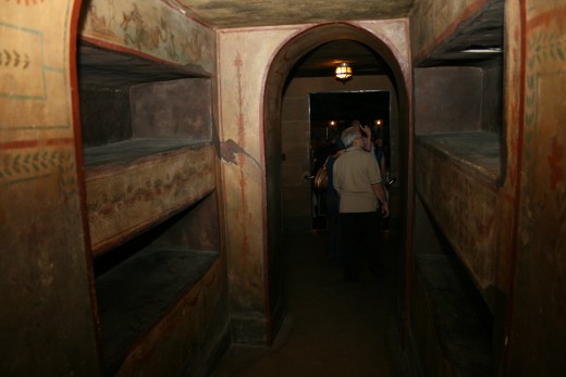 The reproduction of catacombs includes niches for the dead.