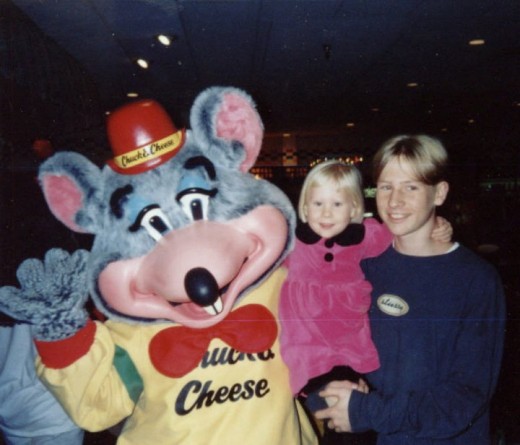 me and my sister (and Chucky) circa 1995. Notice my Stussy long sleeved t shirt and 90's style hair cut...