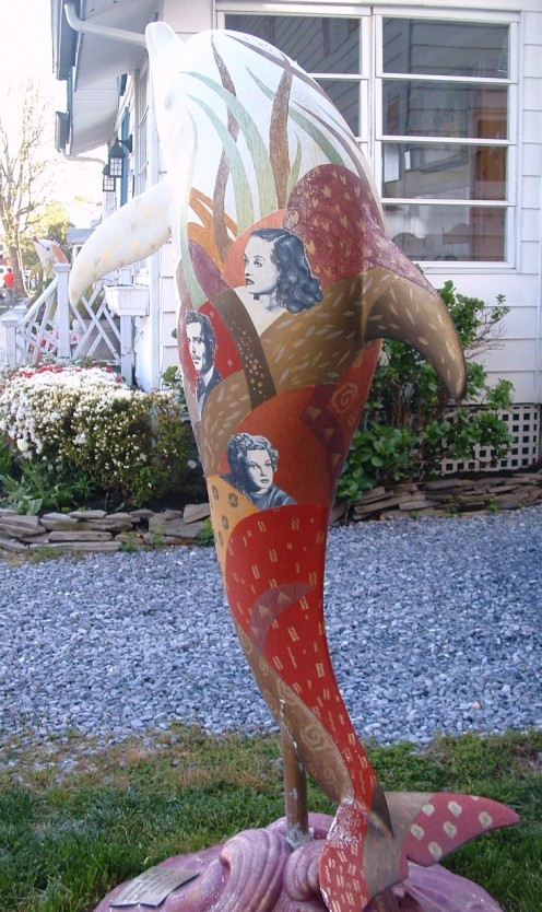Betty Davis, Clark Gable and Judy Garland adorn the dolphin sculpture in front of the BEDazzled Bed & Breakfast. 