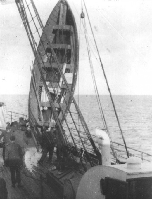 R.M.S Titanic's lifeboat being drained of water on-board R.M.S Carpathia